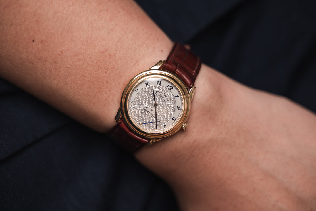 Curved lugs burgundy crocodile strap on a Paul Gerber Retro Twin.